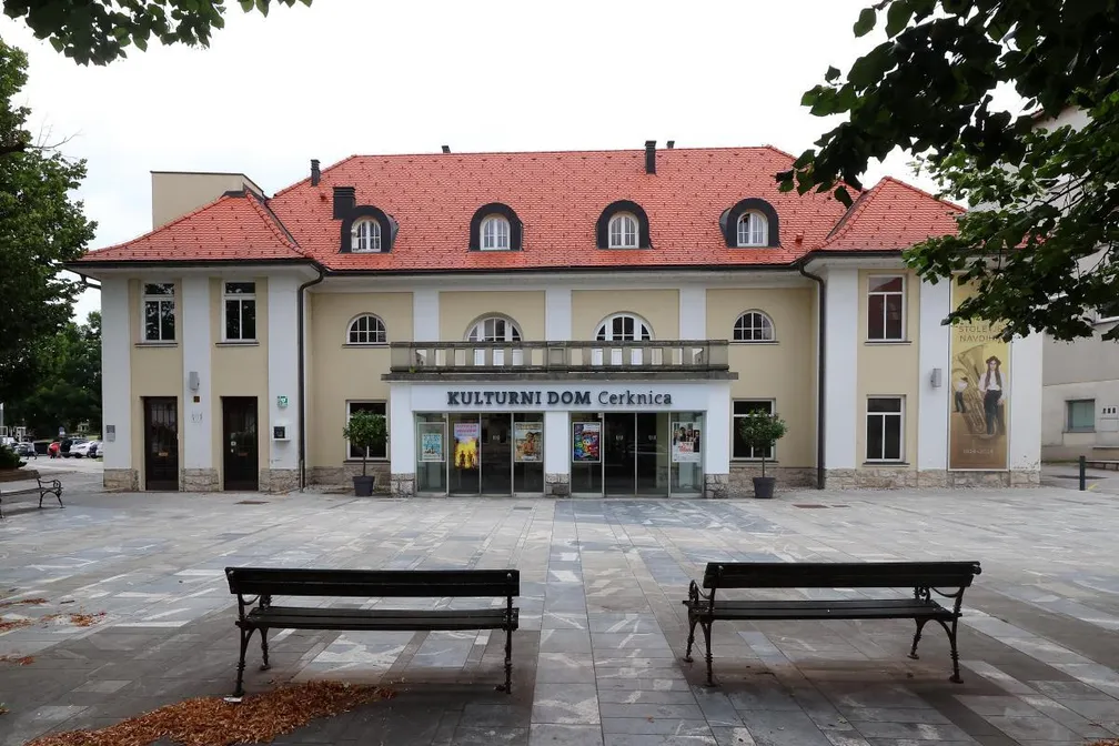 Benches and platform in front of the Cultural Center Cerknica.