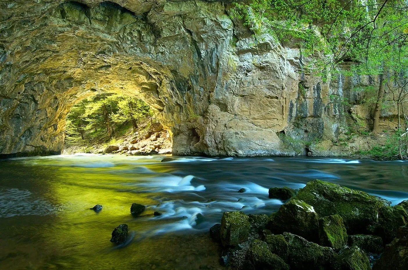 Big natural bridge in Rakov Škocjan, with the Rak stream flowing under it.