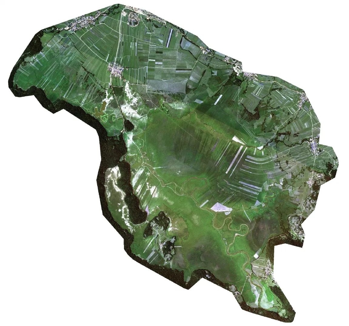 Satellite image of Lake Cerknica. There is a lot of green space in the photo, as Lake Cerknica is empty.
